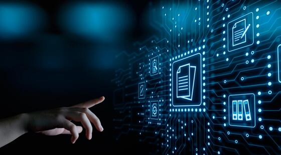 Mano apuntando a lo que simula ser una pantalla táctil gigante